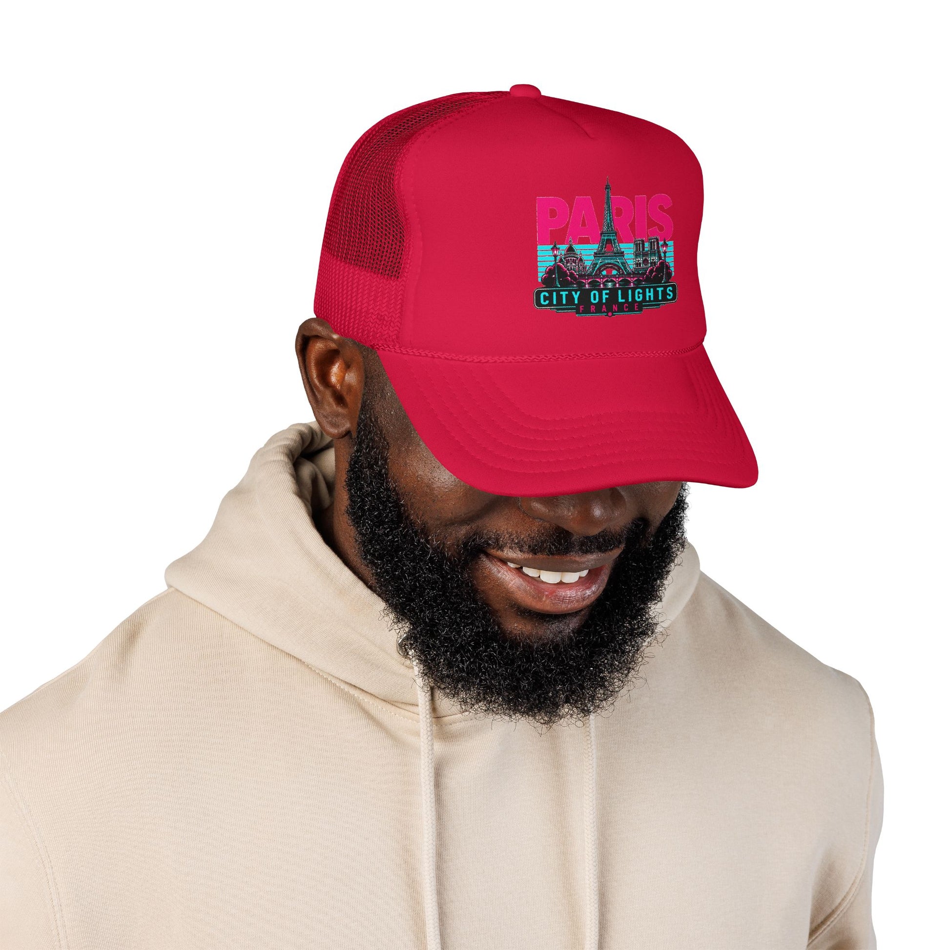 Red trucker hat with front “PARIS City of Lights” graphic and mesh back panels.
