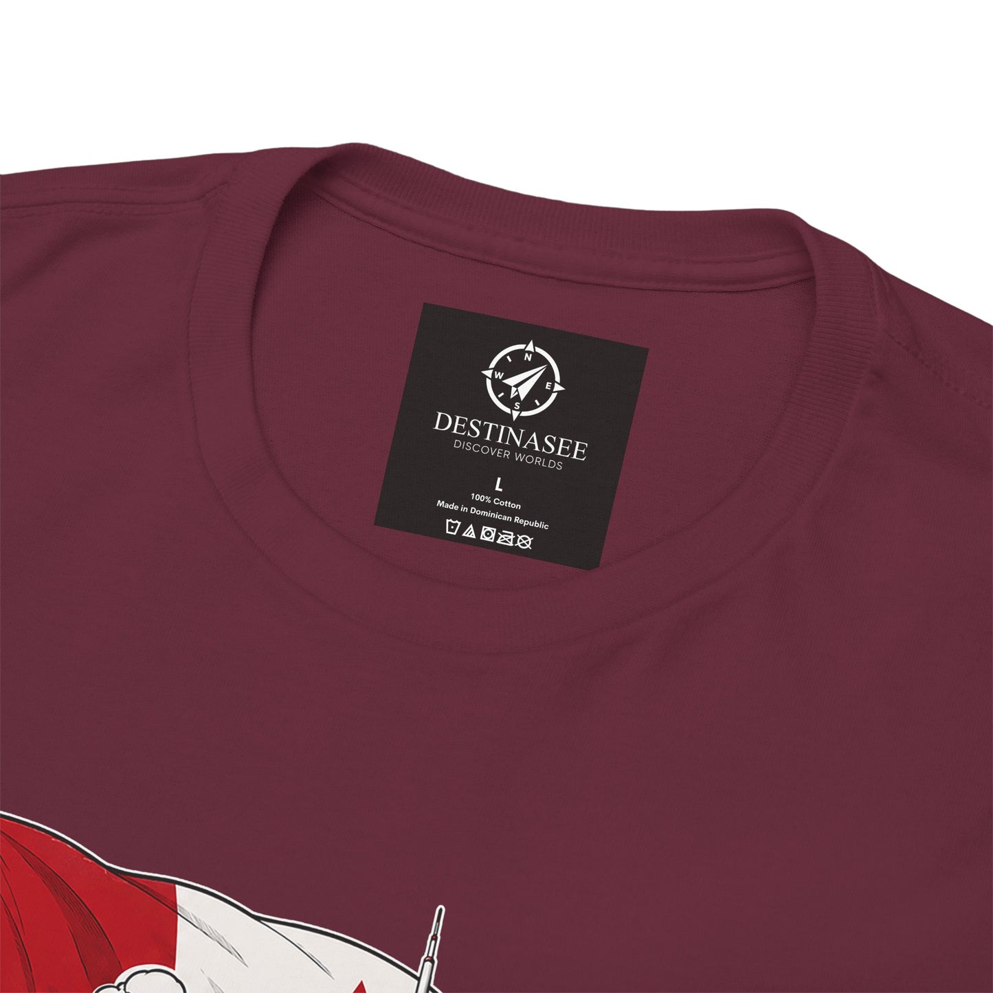 Maroon T-shirt close-up of neck label with Canada graphic artwork on chest