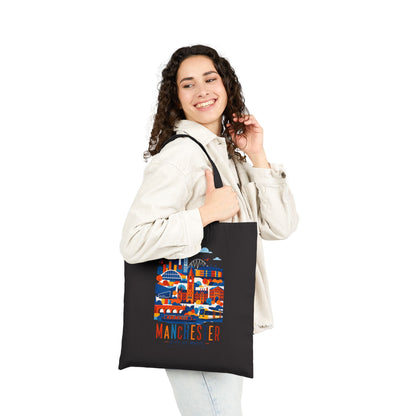 Black cotton tote bag with long handles and Manchester skyline graphic front.