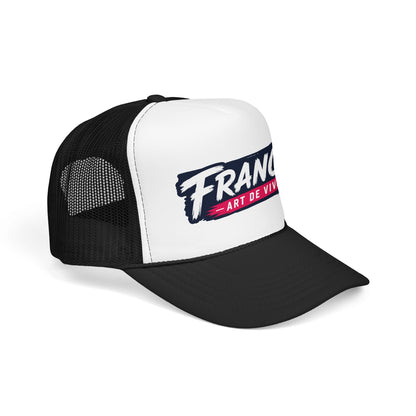 Black-and-white trucker hat with mesh sides, curved brim, and 'FRANCE Art de Vivre' logo