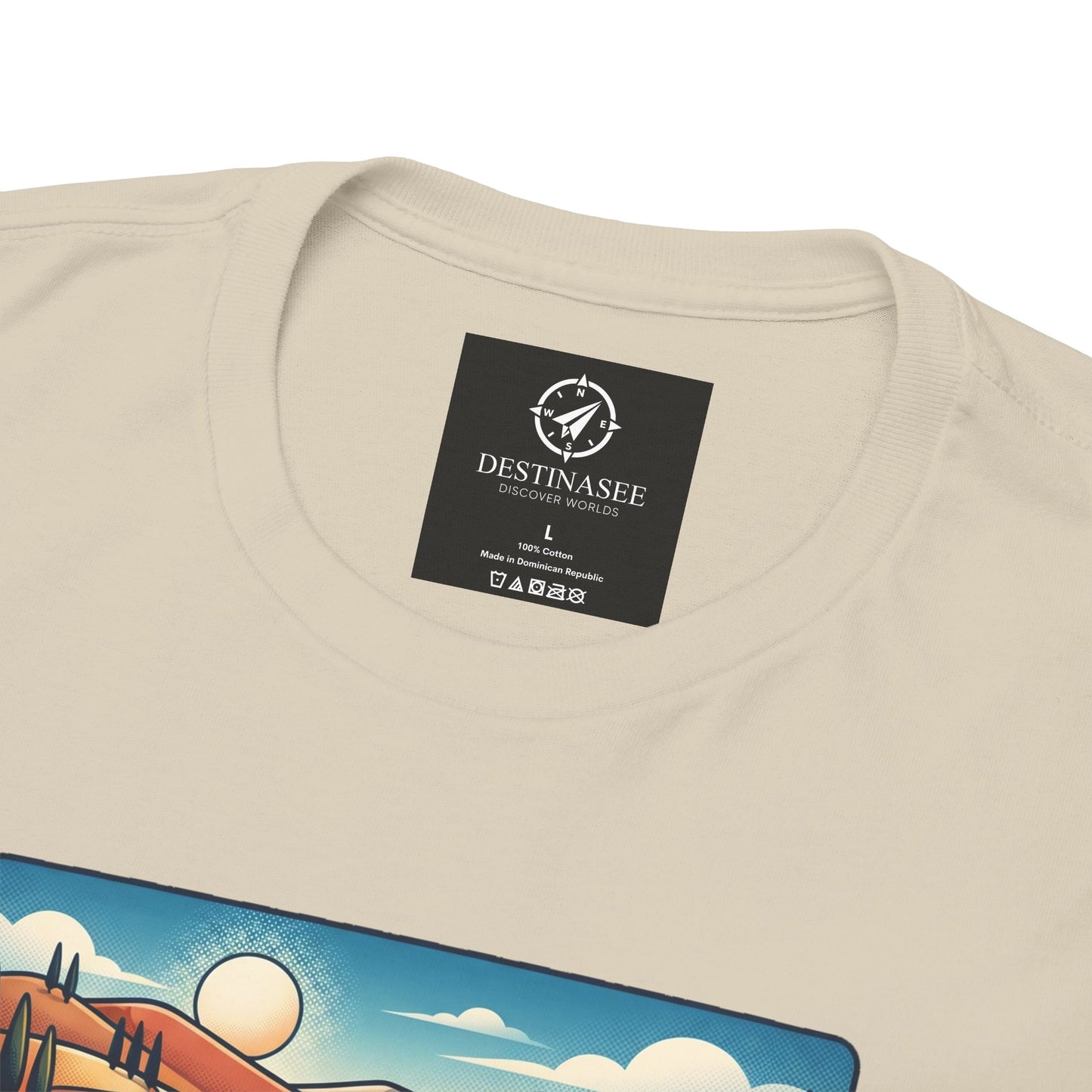 Beige T-shirt back with DESTINASEE care label and partial scenic graphic