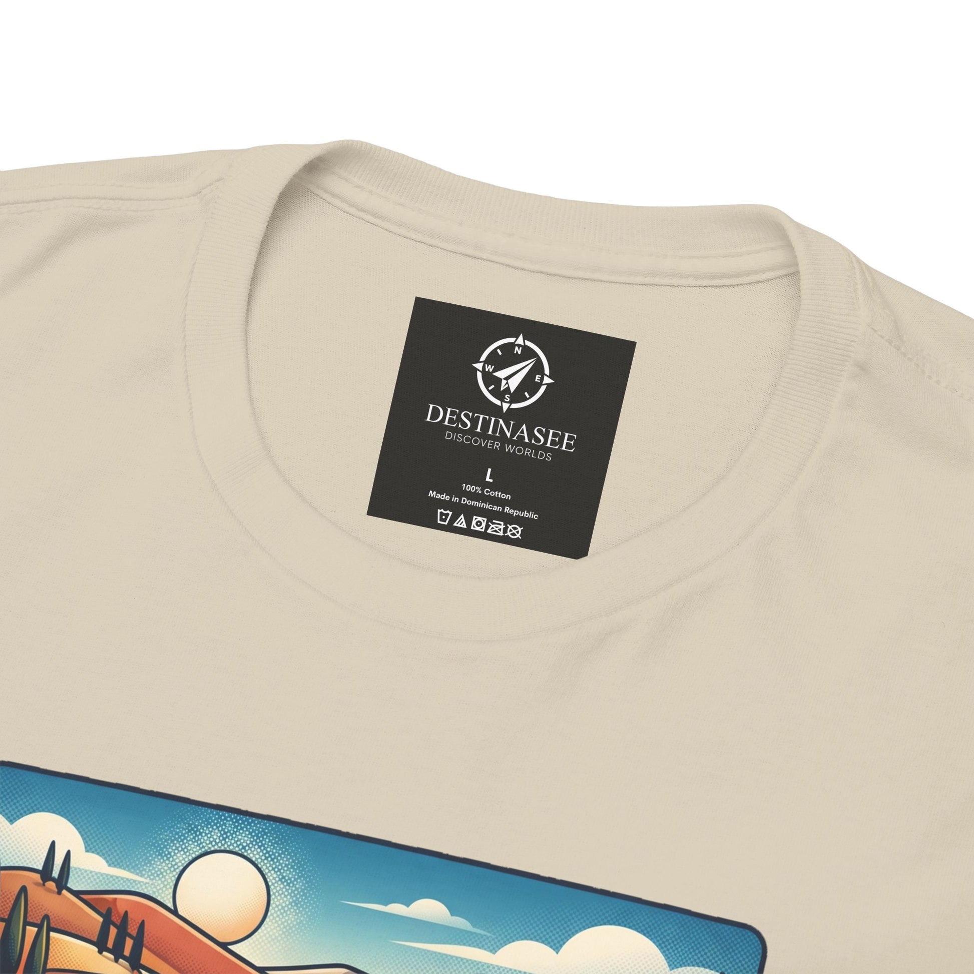 Beige T-shirt back with DESTINASEE care label and partial scenic graphic