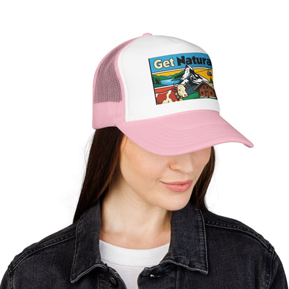 Light pink and white trucker hat with front logo patch and curved brim on model