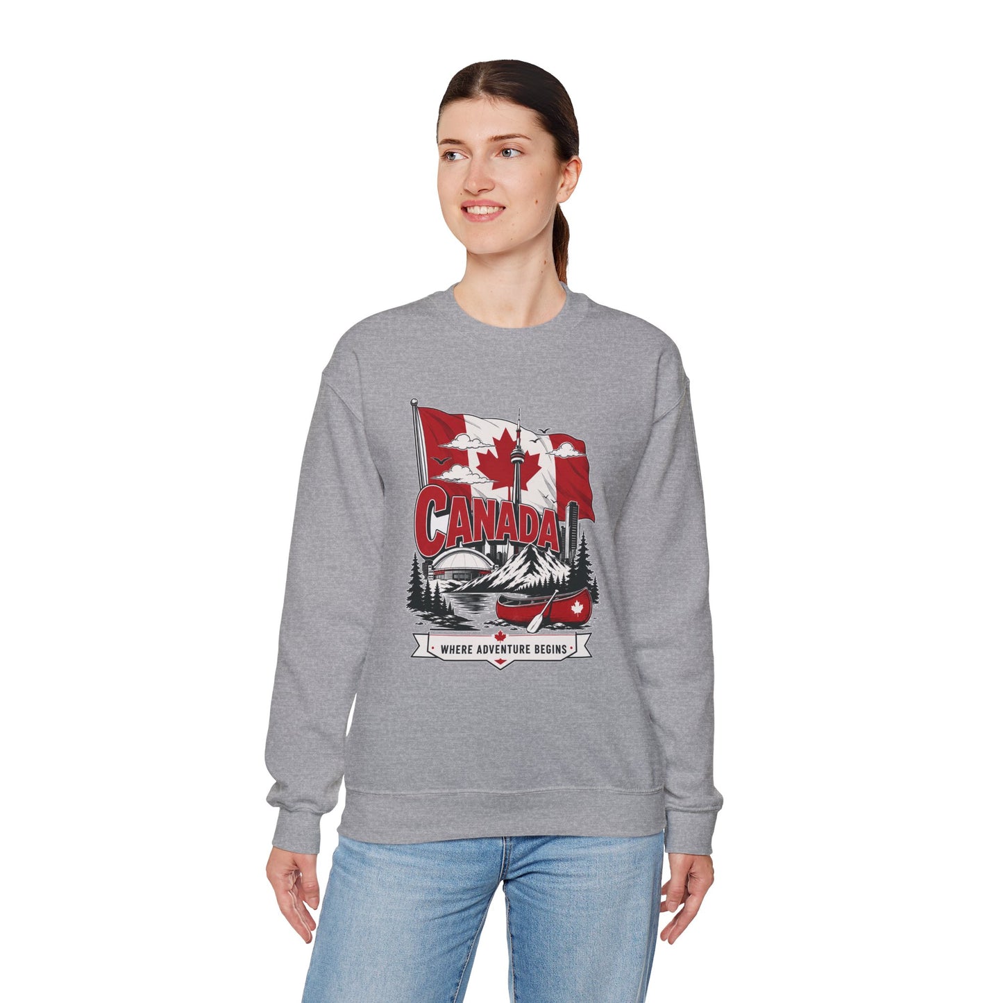 Sport gray crewneck sweatshirt on model with Canada flag canoe graphic and long sleeves.