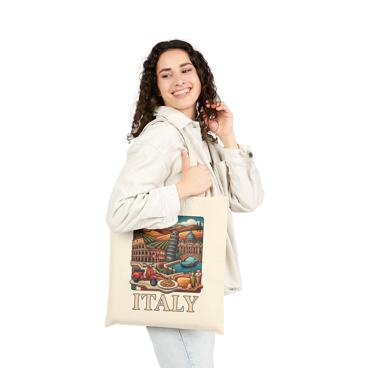 Natural canvas tote bag worn by a woman, showing “ITALY” scenic front print