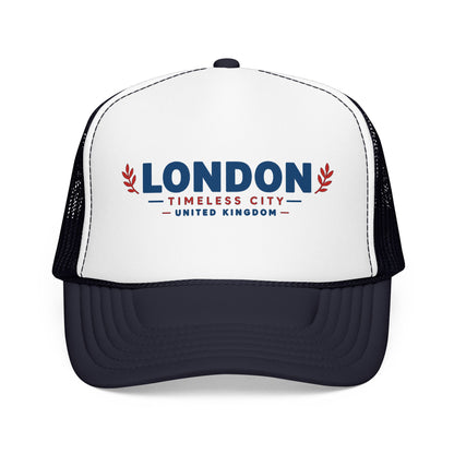 Two-tone foam trucker hat with London logo, white crown and dark mesh sides, curved dark bill.