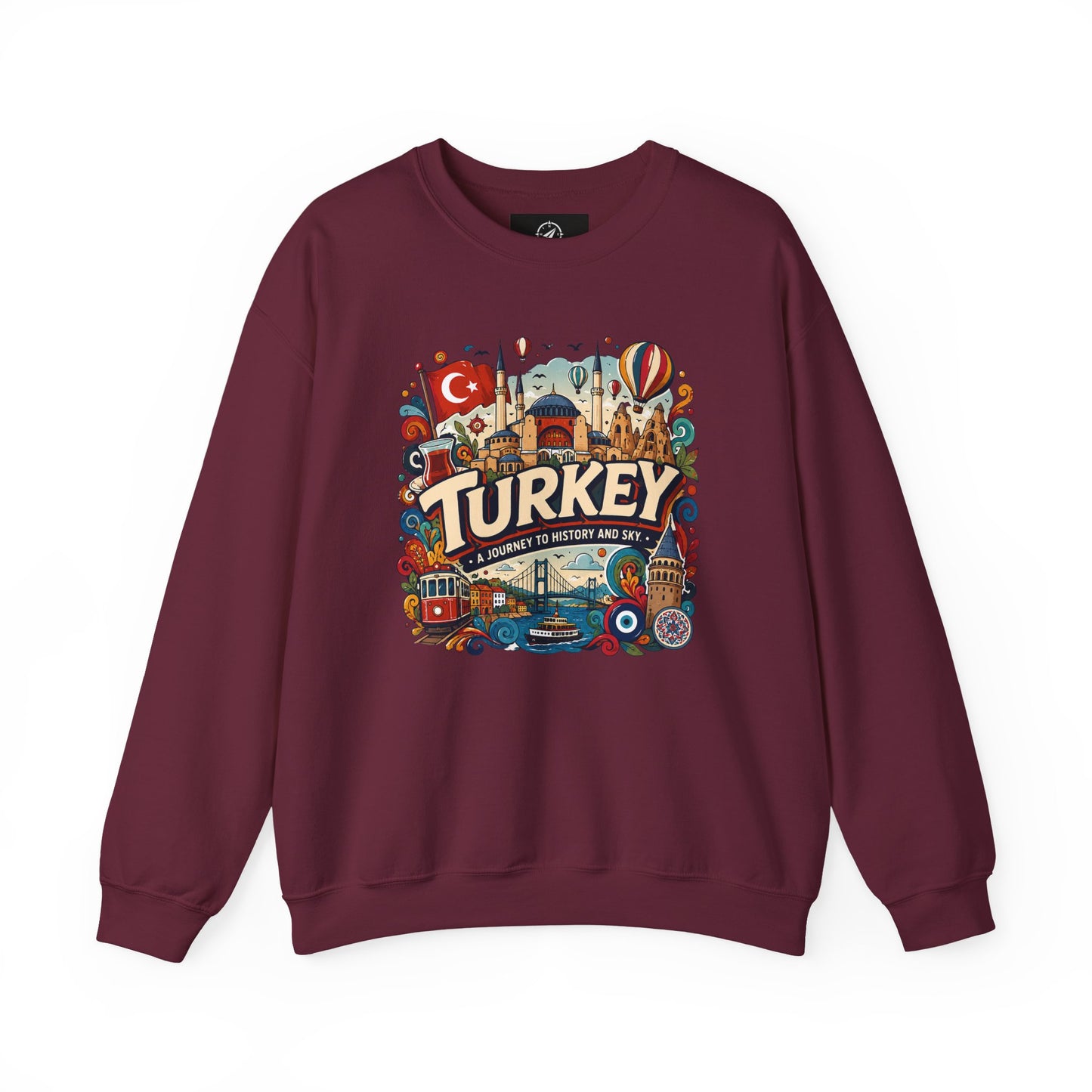 Maroon crewneck sweatshirt with colorful Turkey travel graphic on chest