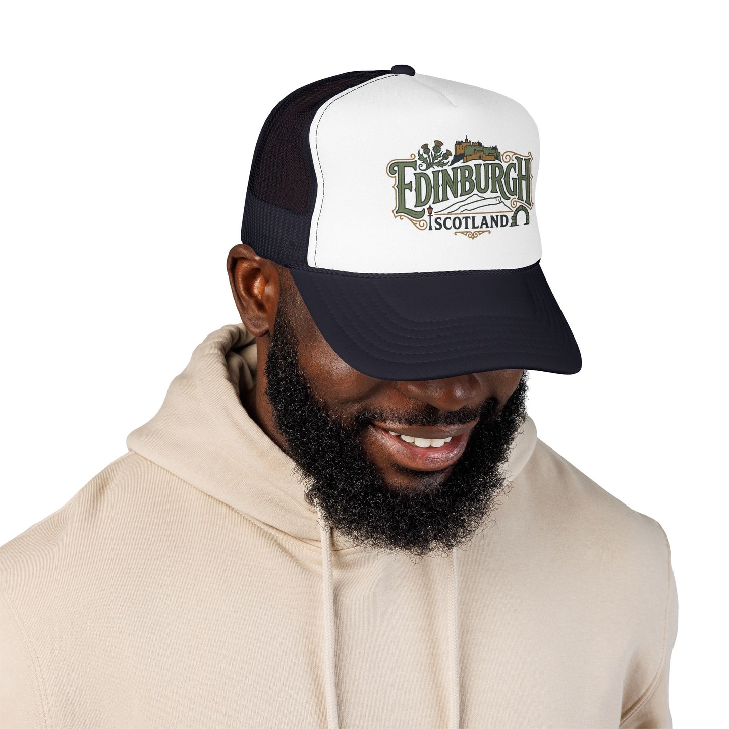 White front and dark mesh trucker hat with “Edinburgh Scotland” logo and curved brim