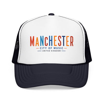 White and dark navy trucker hat with Manchester City of Music logo on front.