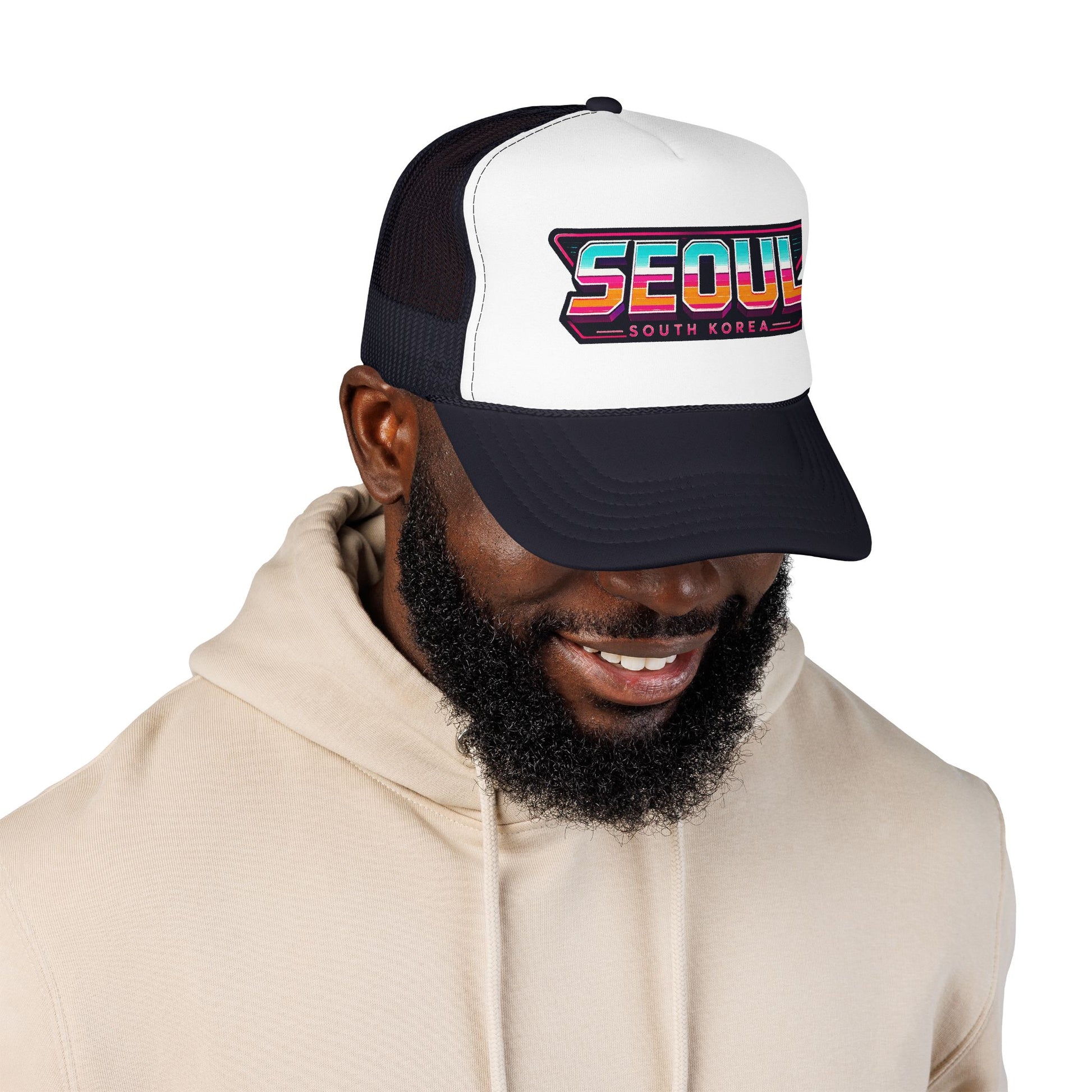 Black and white trucker hat worn by man, front Seoul logo graphic