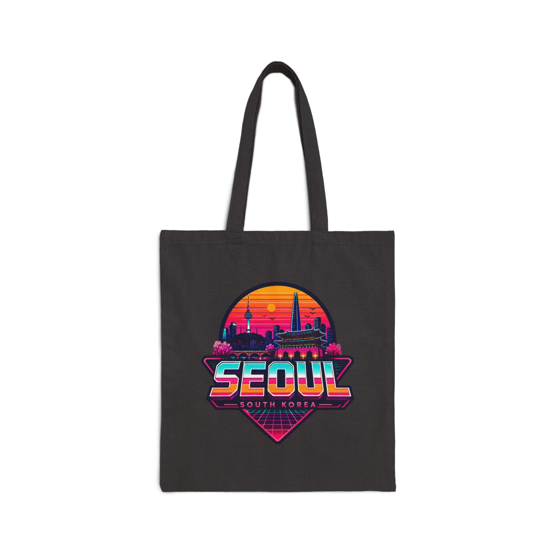 Black canvas tote bag with colorful Seoul skyline graphic and Seoul text.