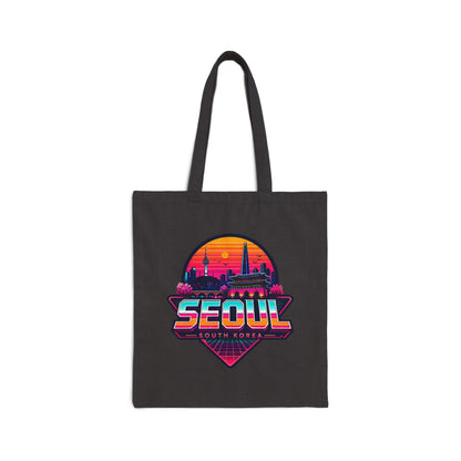 Black canvas tote bag with colorful Seoul skyline graphic and Seoul text.