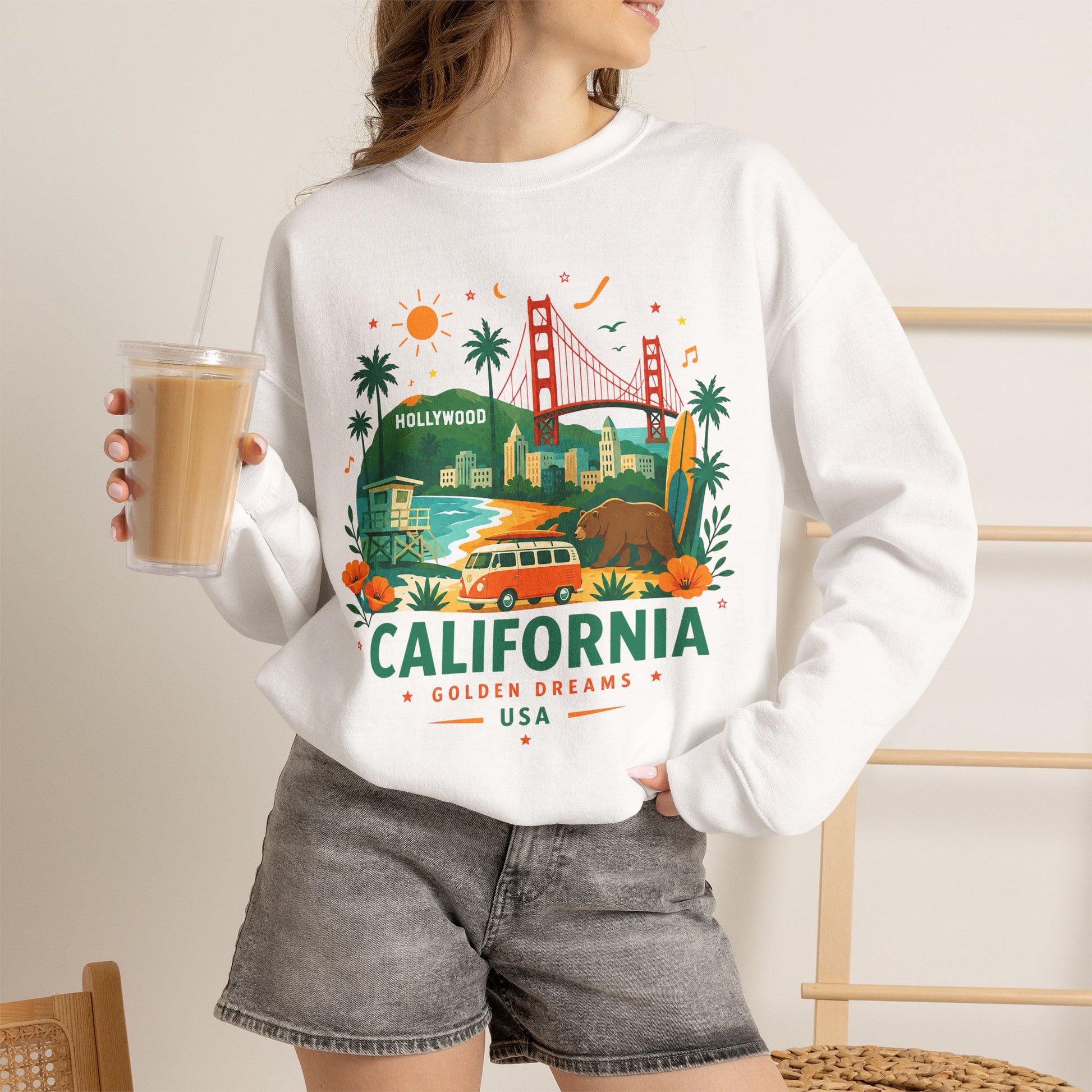 Sand crewneck sweatshirt worn by a model with California front graphic