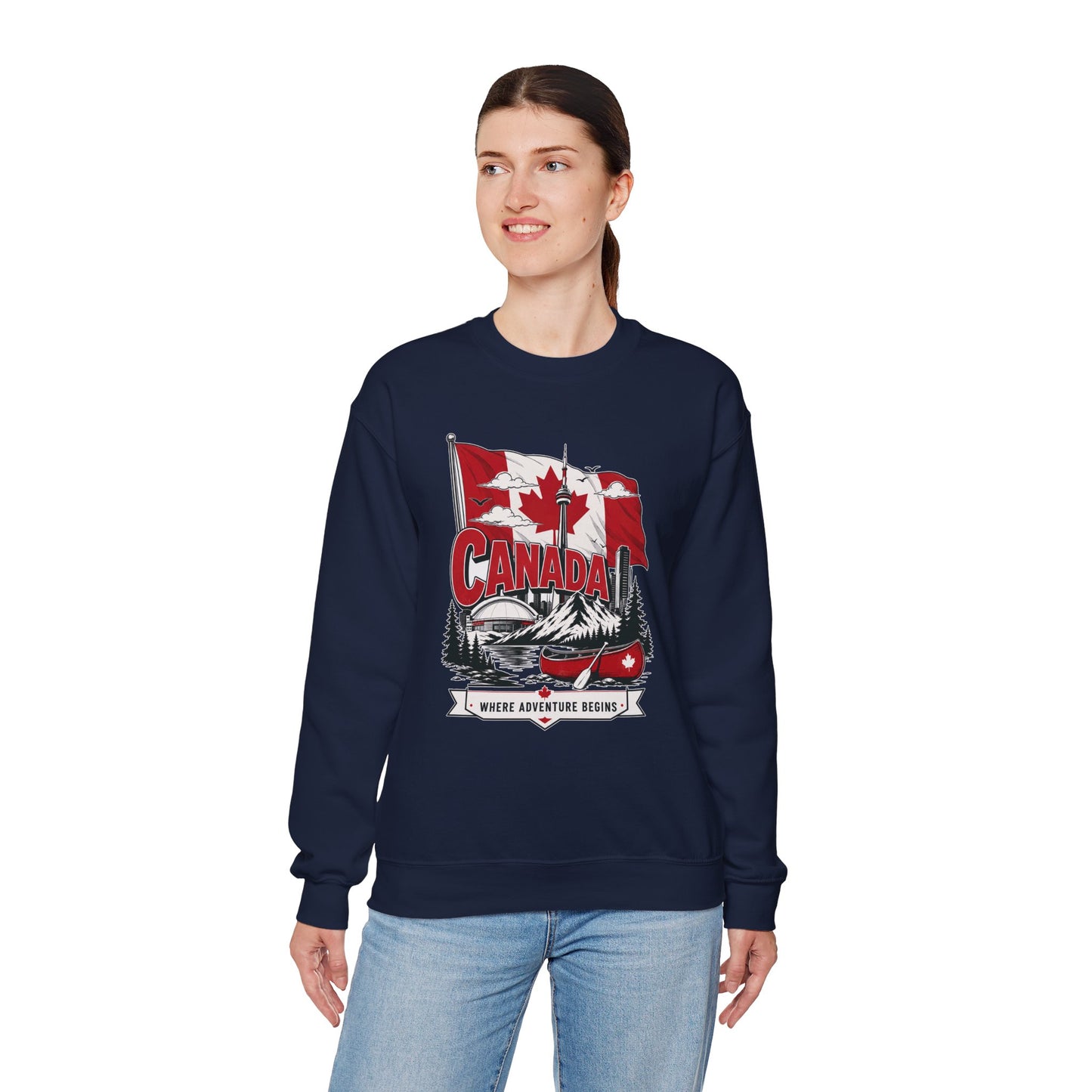 Navy crewneck sweatshirt on model with Canada flag canoe graphic and long sleeves.
