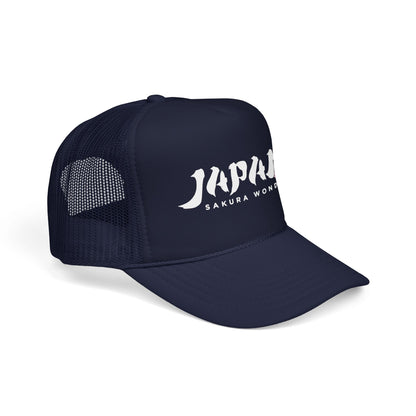 Dark navy trucker hat with mesh back and JAPAN SAKURA WONDER logo.