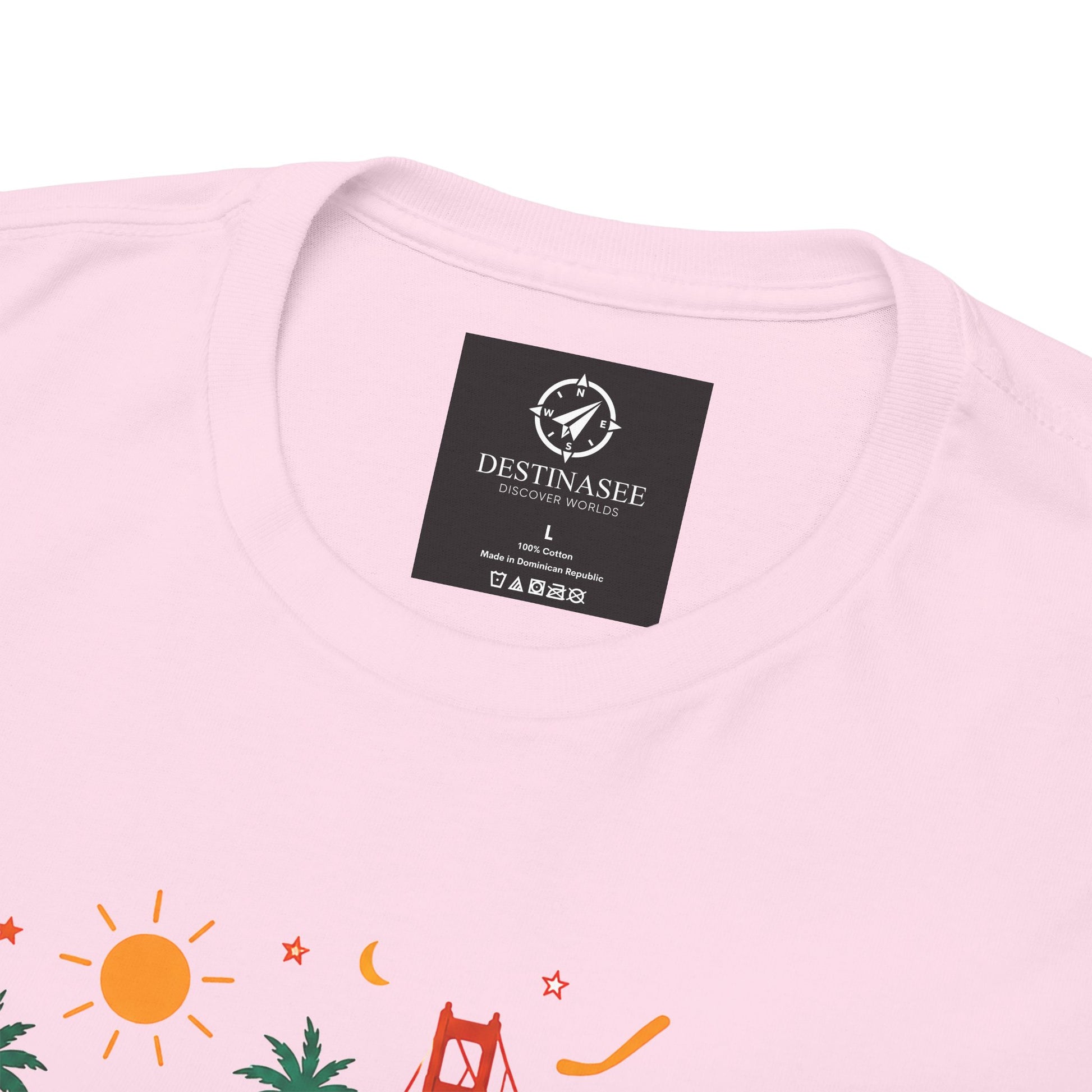 Light pink crew-neck T-shirt with brand tag at neckline and colorful scene accents