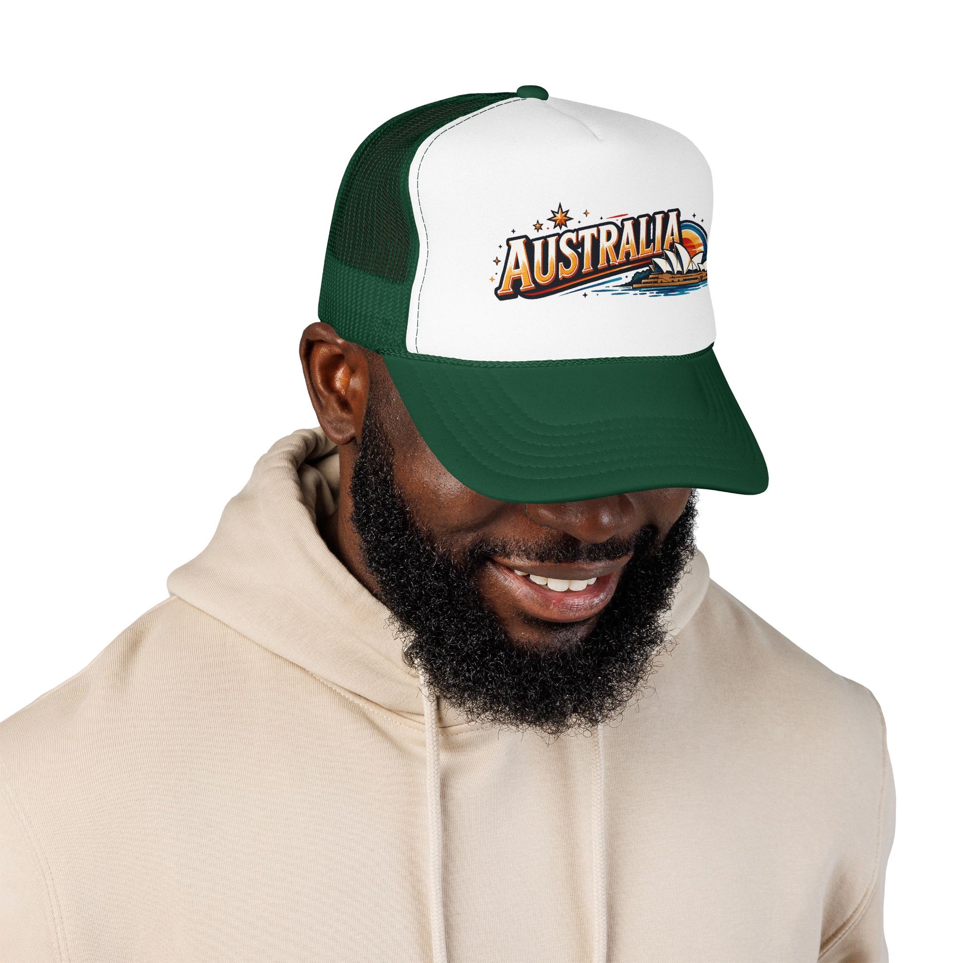 Trucker cap dark green and white mesh worn by man; front Australia logo patch