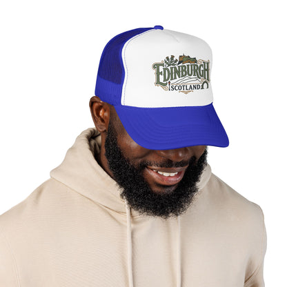 Blue and white mesh trucker hat with “Edinburgh Scotland” logo and curved blue brim