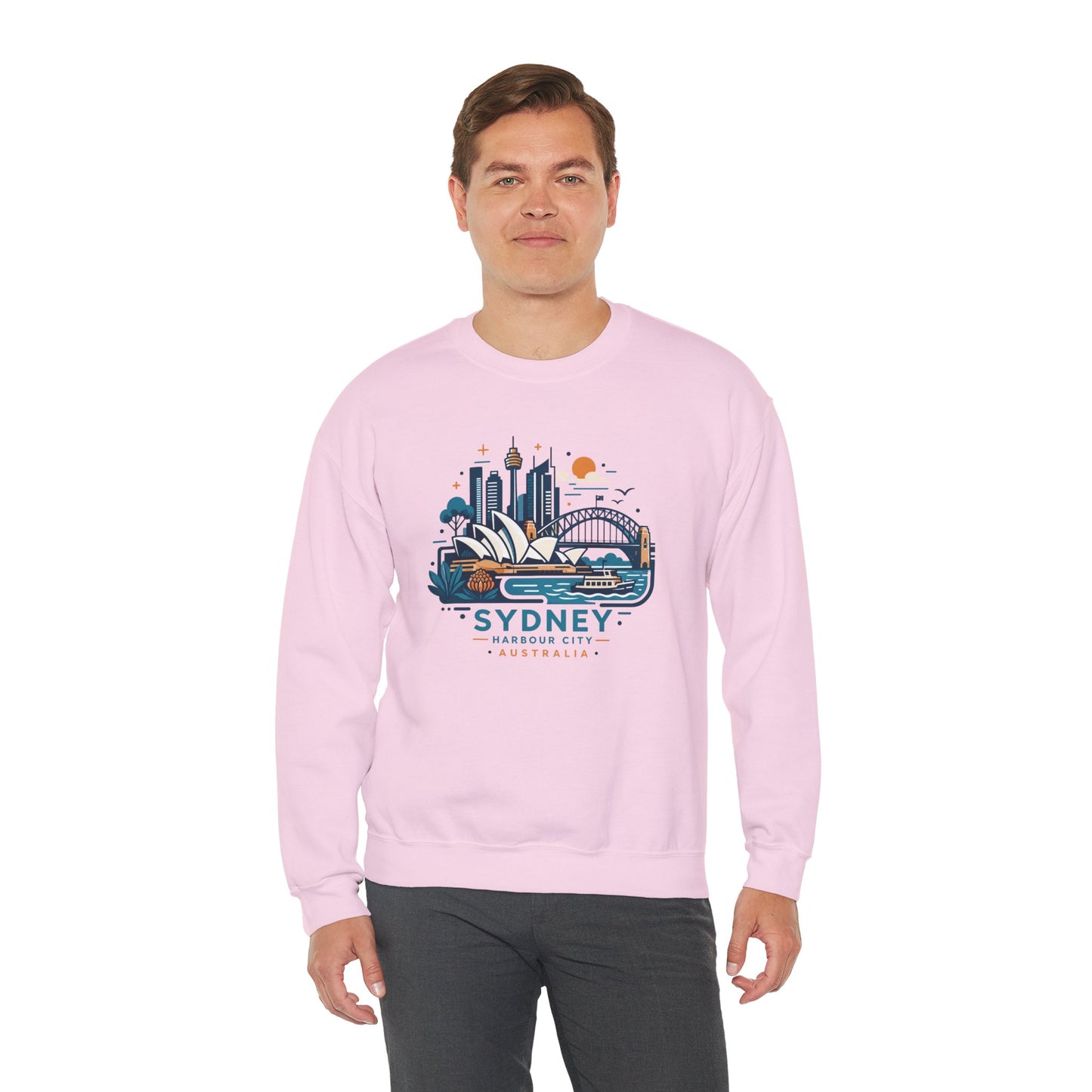 Pink crewneck sweatshirt worn by model, front graphic visible