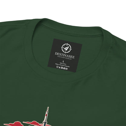 Green T-shirt back with small square brand logo at neckline and partial skyline graphic.