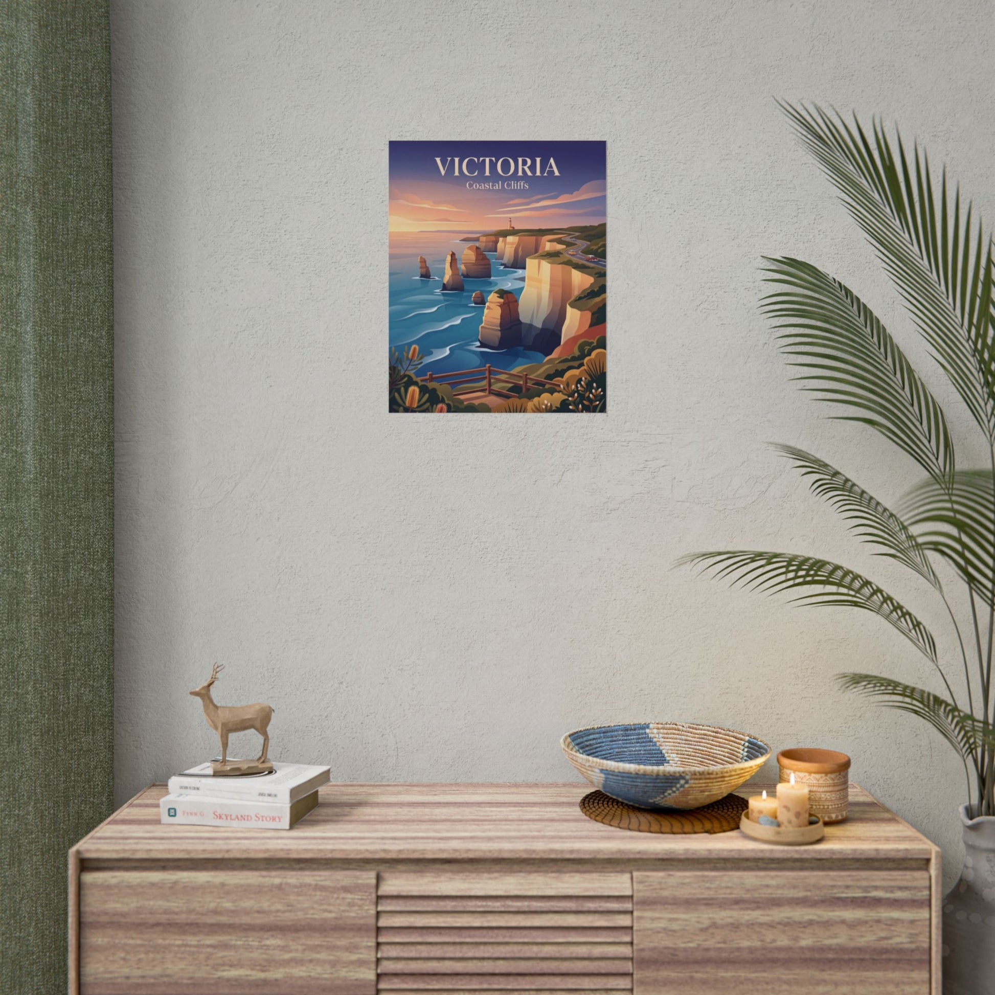 Rolled Australia coastal cliffs poster on wall, showing cliffs, ocean, and sunset