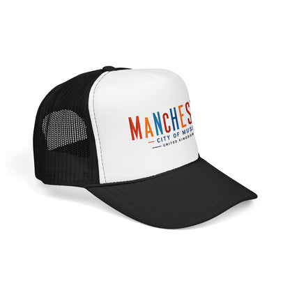 White front trucker hat with black mesh sides, Manchester logo, and curved brim