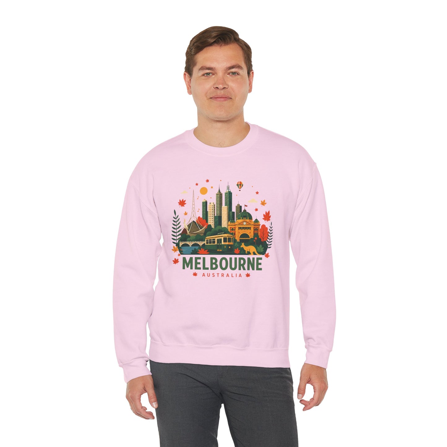 Pink crewneck sweatshirt worn by model, front graphic print