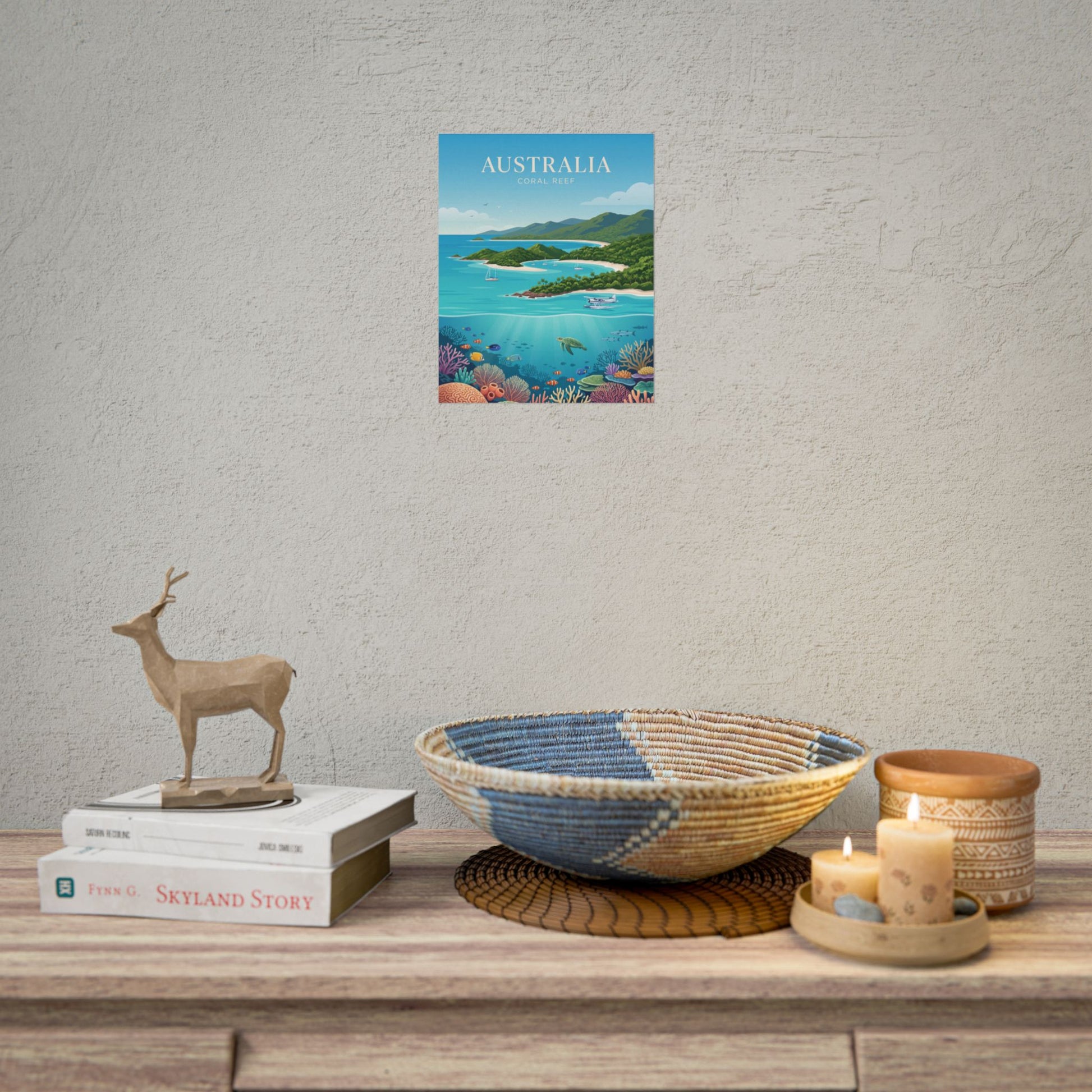 Australia coral reef rolled poster displayed on wall, featuring turquoise ocean, corals, and fish.