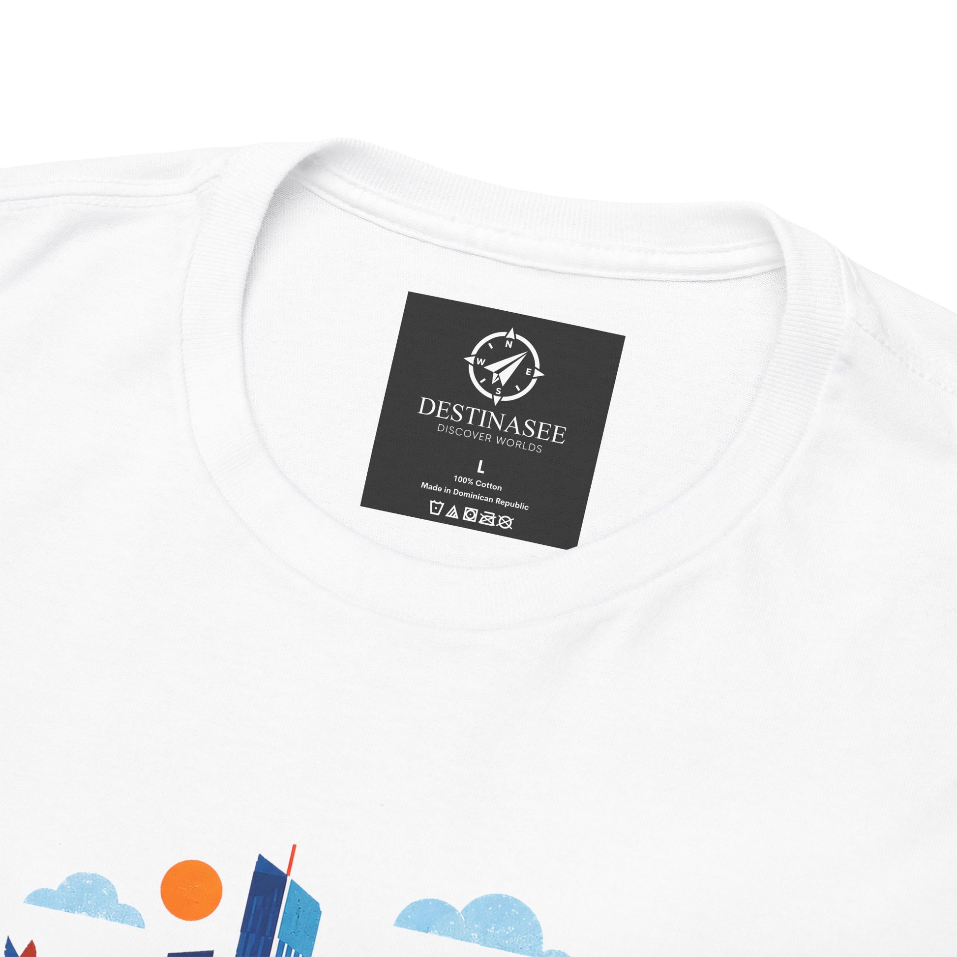 Light t-shirt close-up showing crew-neck label and top of skyline print