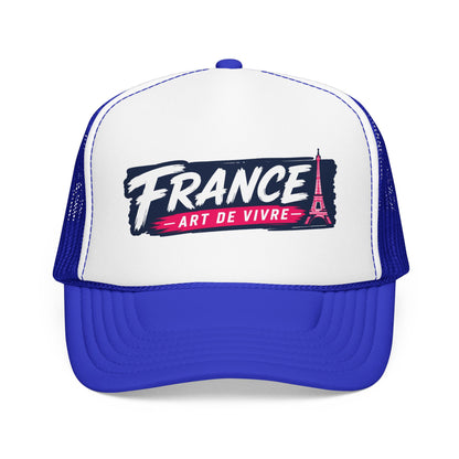 Blue and white trucker hat with mesh sides and “FRANCE Art de Vivre” front print