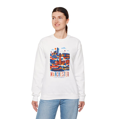 White crewneck sweatshirt with colorful Manchester city graphic, worn with jeans