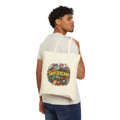 Natural canvas tote bag worn on back, with Switzerland graphic on the front