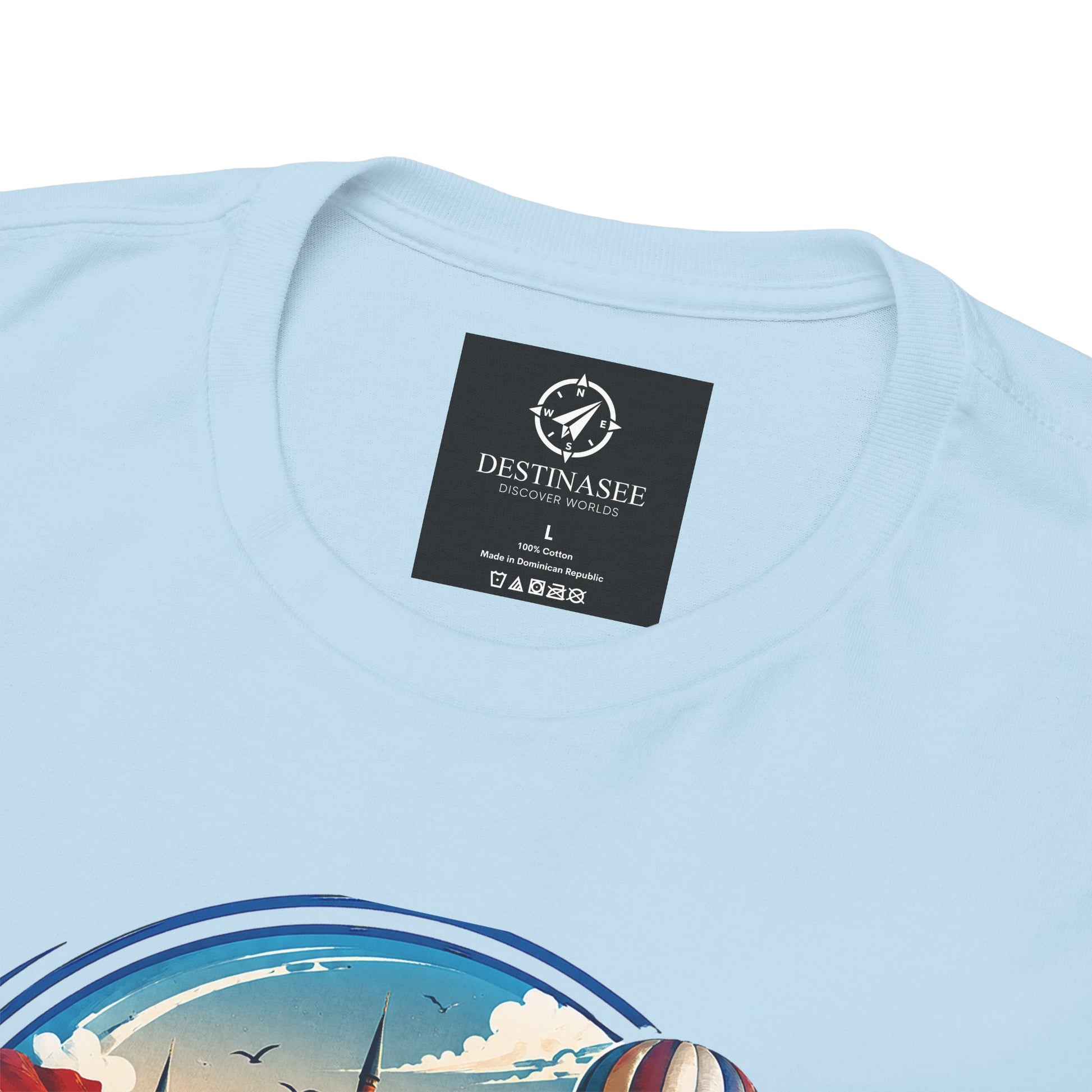Light blue T-shirt neckline tag with partial Turkey graphic print