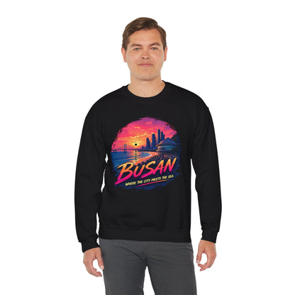 Black crewneck sweatshirt with long sleeves and colorful front graphic print.