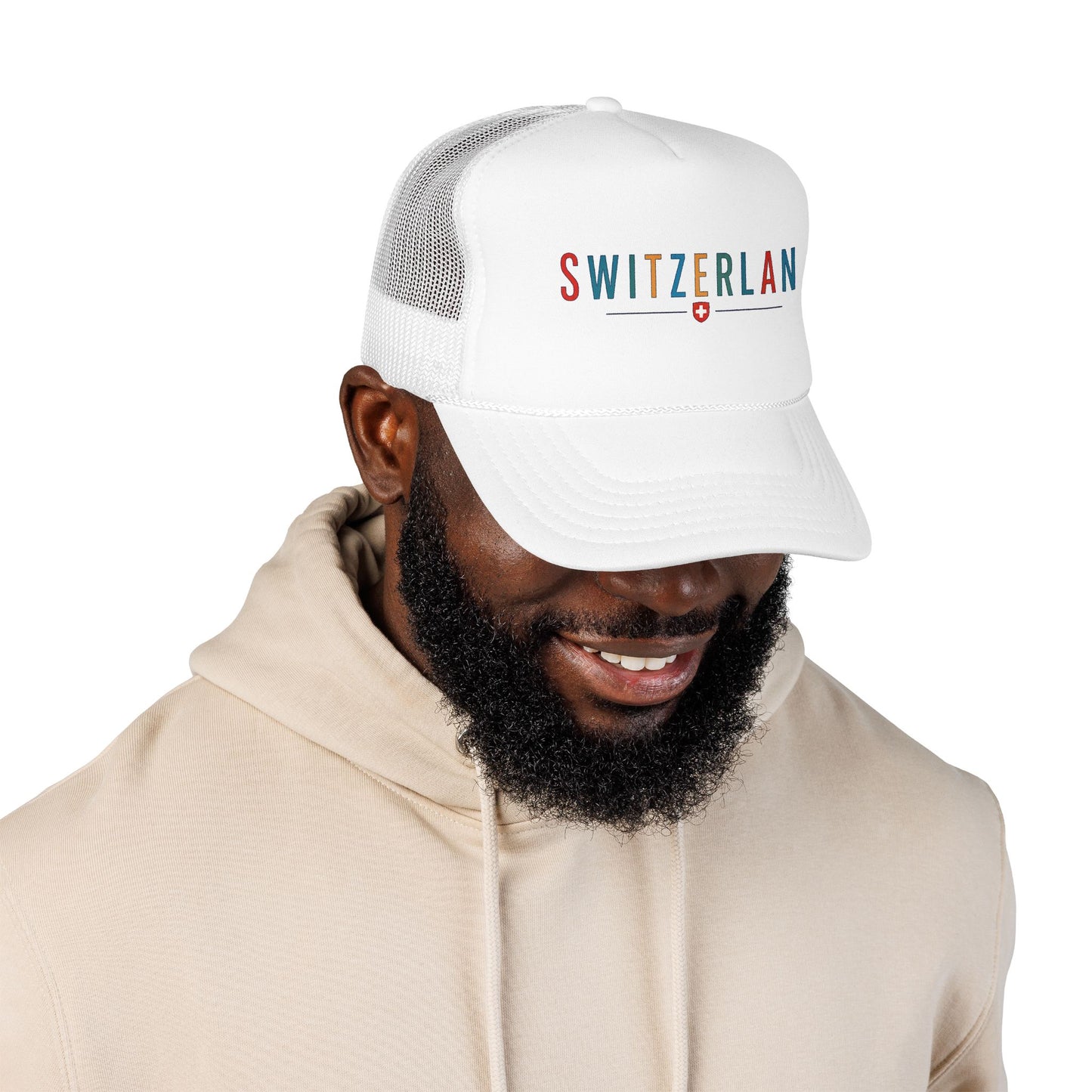 White trucker cap with curved brim, mesh back, and SWITZERLAND logo