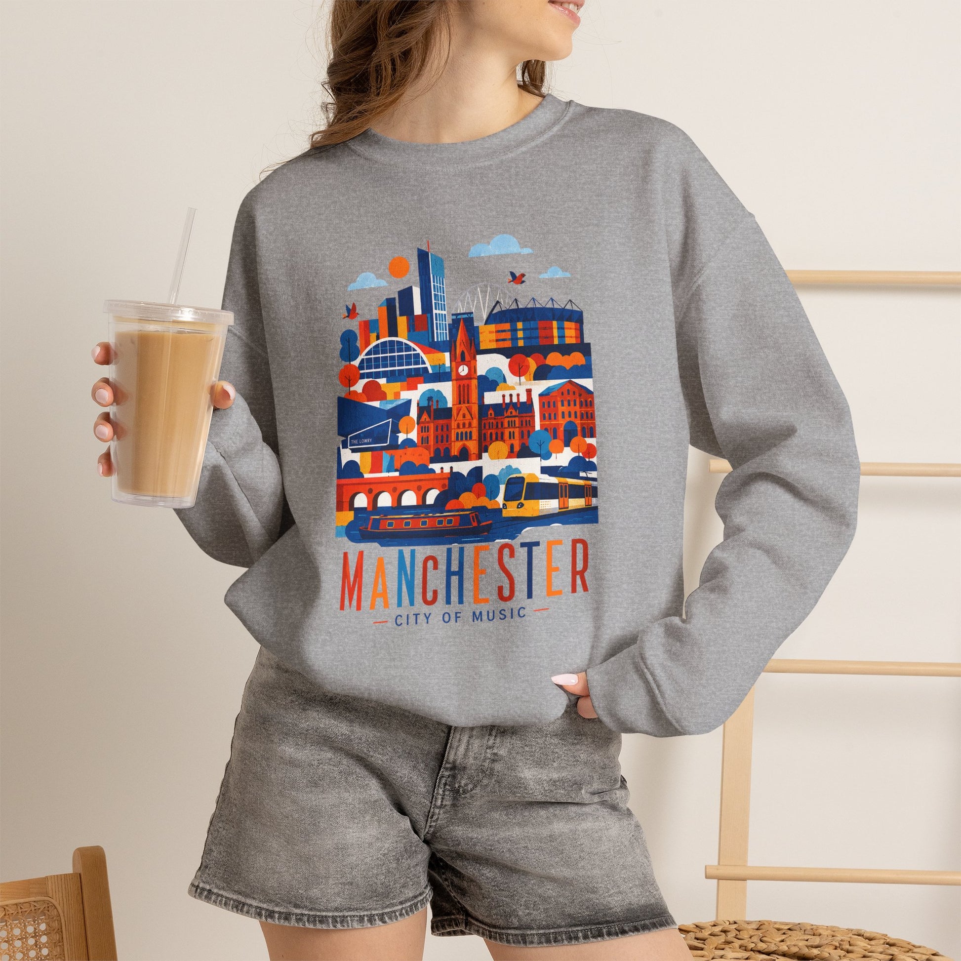 Manchester cityscape crewneck sweatshirt, heather grey, front city graphic and Manchester text