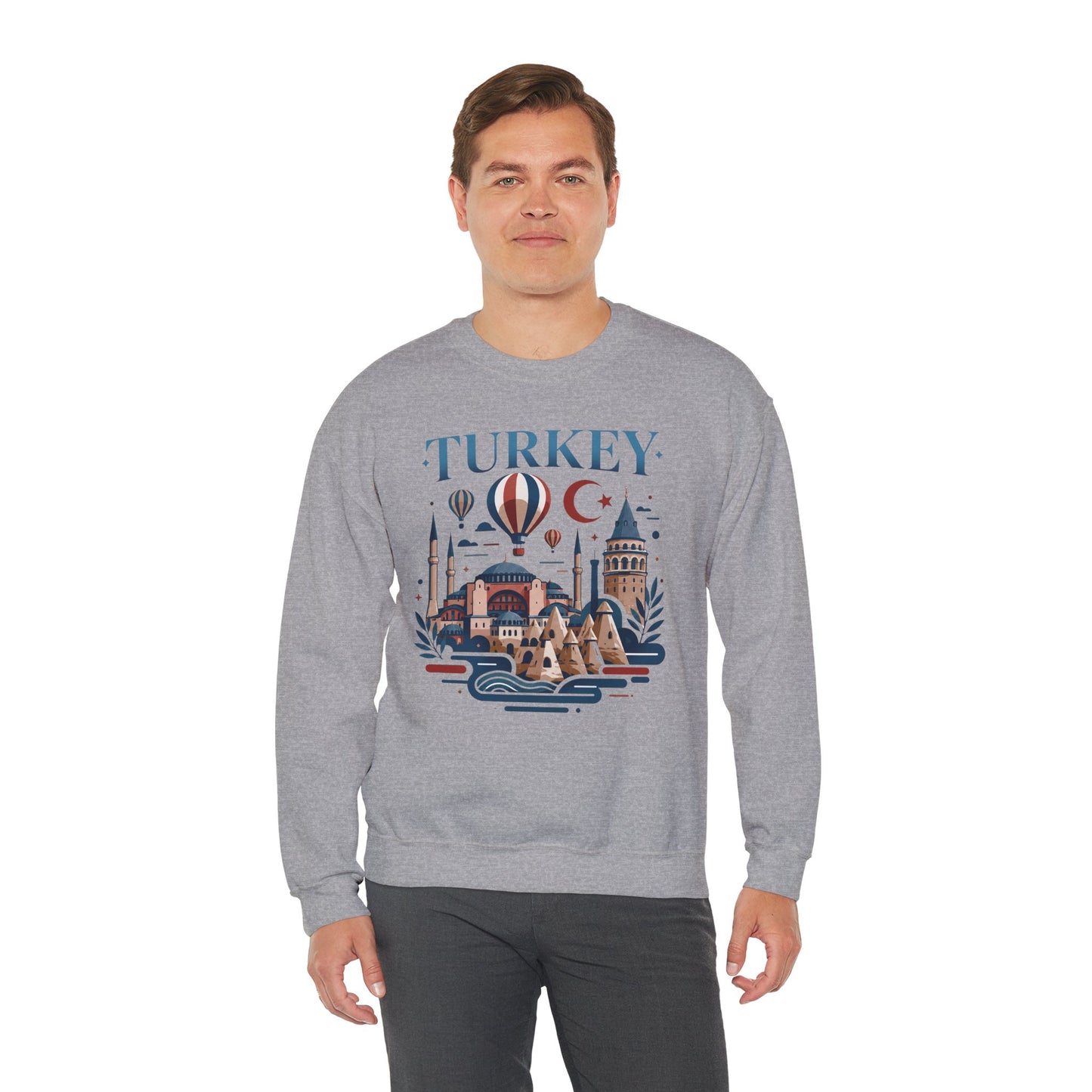 Heather gray turkey travel sweatshirt with long sleeves and colorful front graphic on model