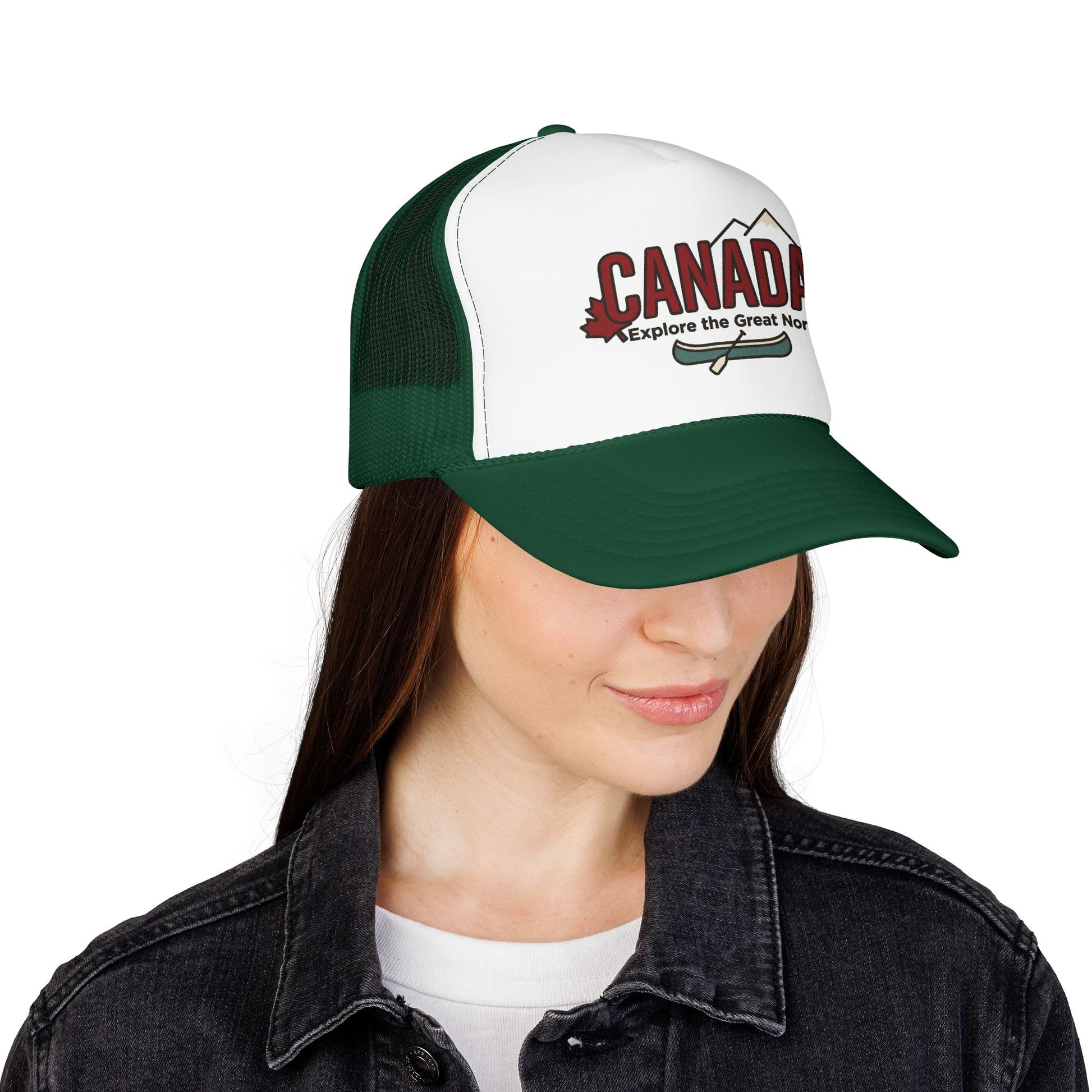 Close-up dark green mesh trucker hat with white front panel and Canada emblem