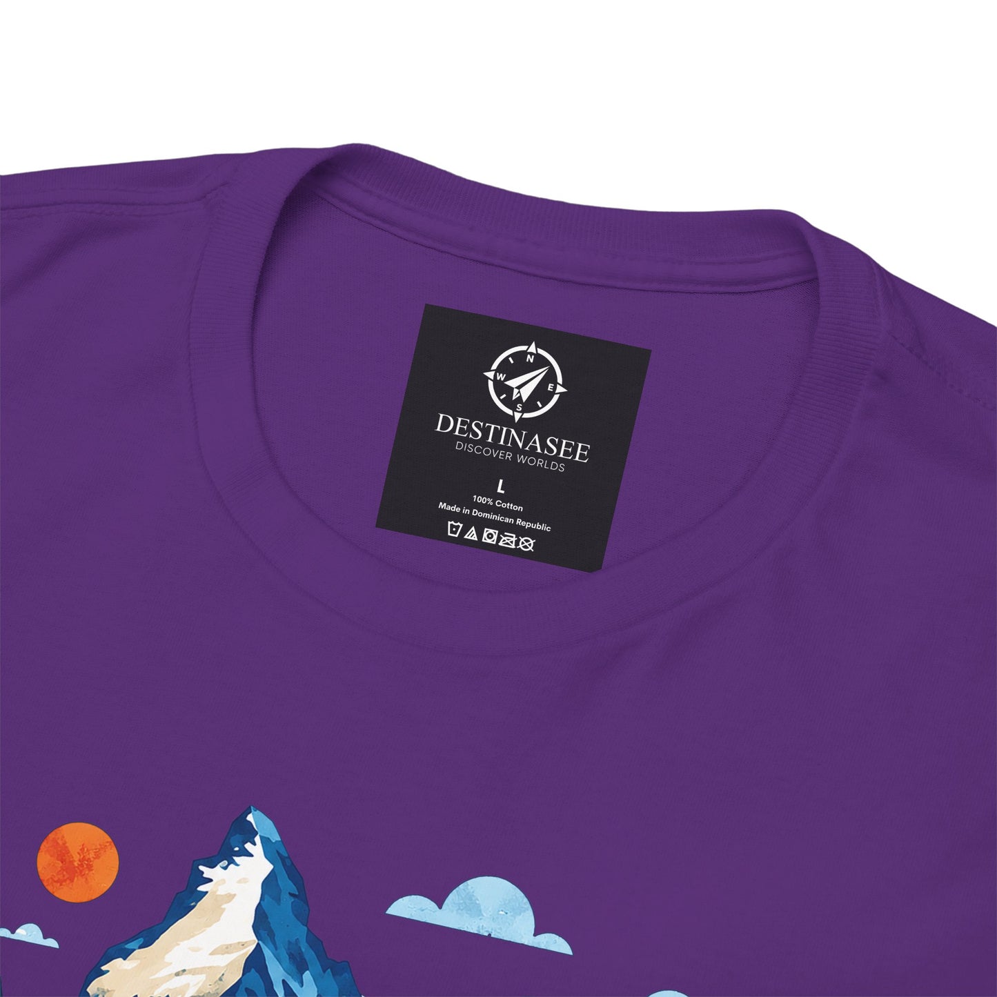 Purple T-shirt with Destinasee neck label and partial mountain graphic