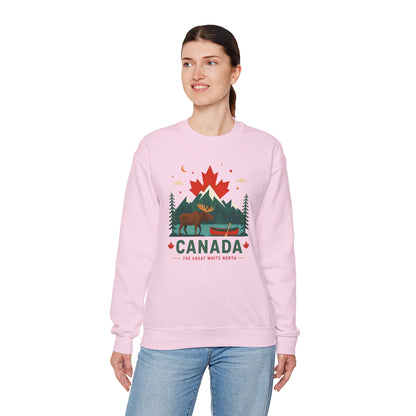 Light pink crewneck sweatshirt with Canada graphic and canoe scene, worn by model