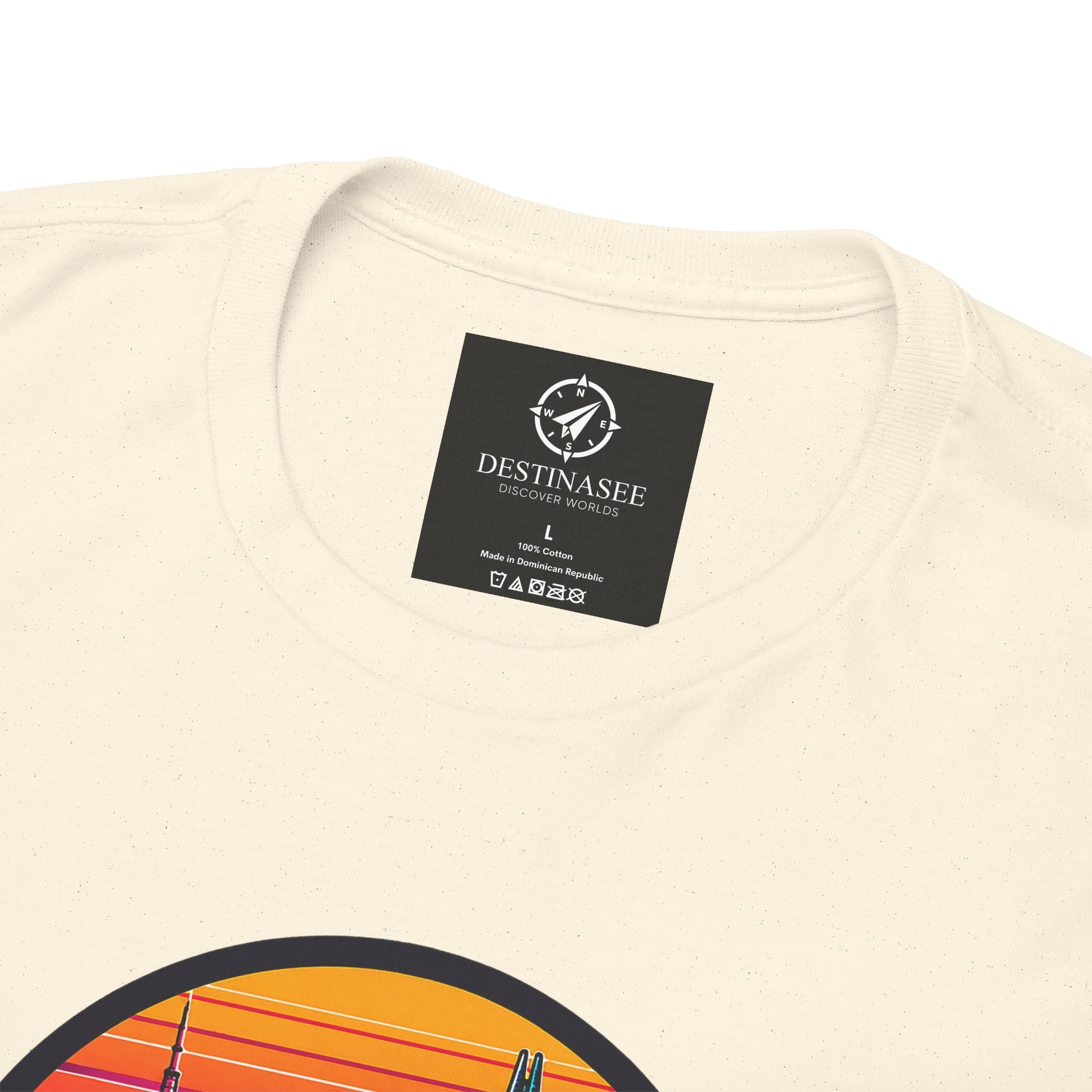 Natural cream t-shirt close-up with neck brand label and partial skyline heart print