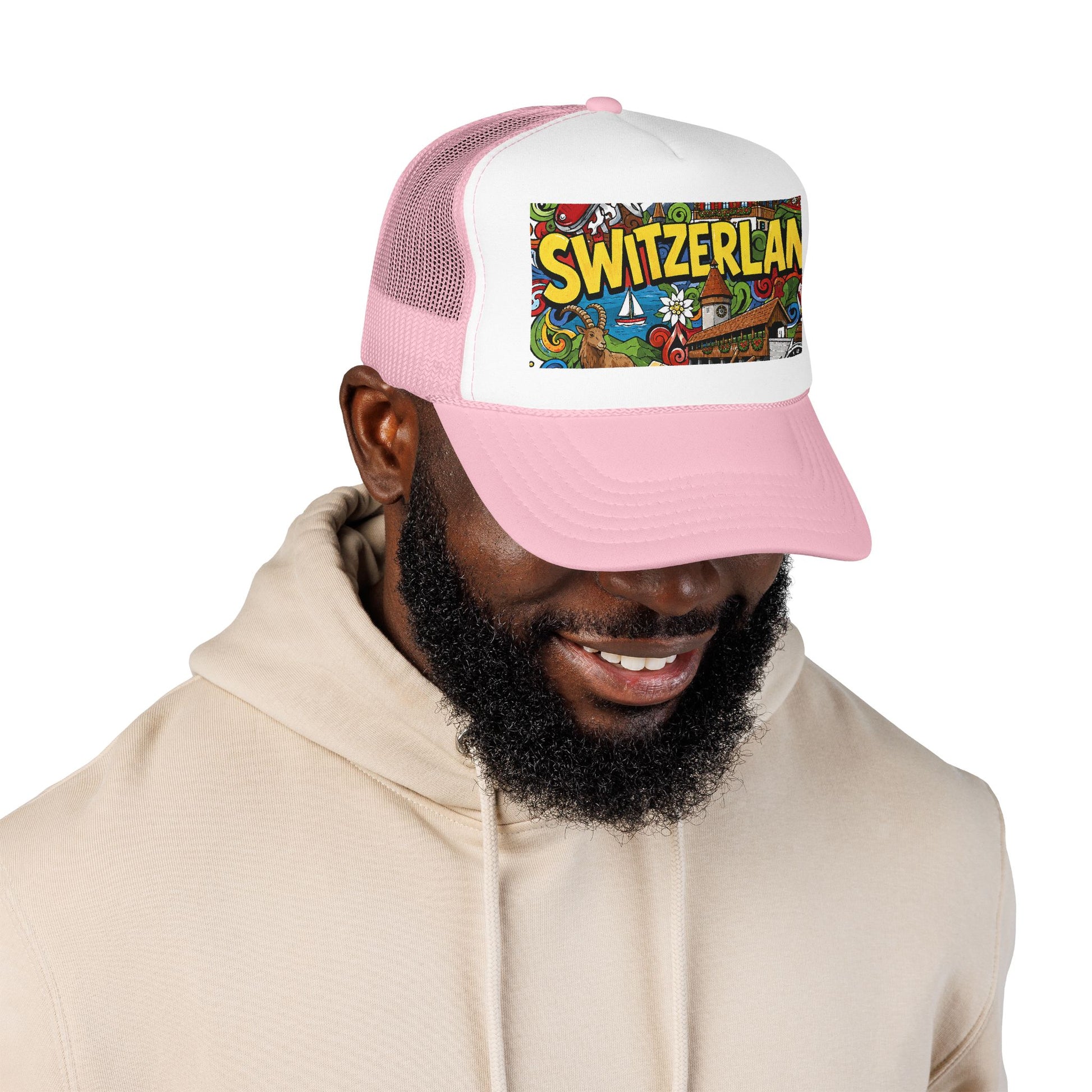 Light pink and white trucker hat with colorful Switzerland graphic patch, worn on head.