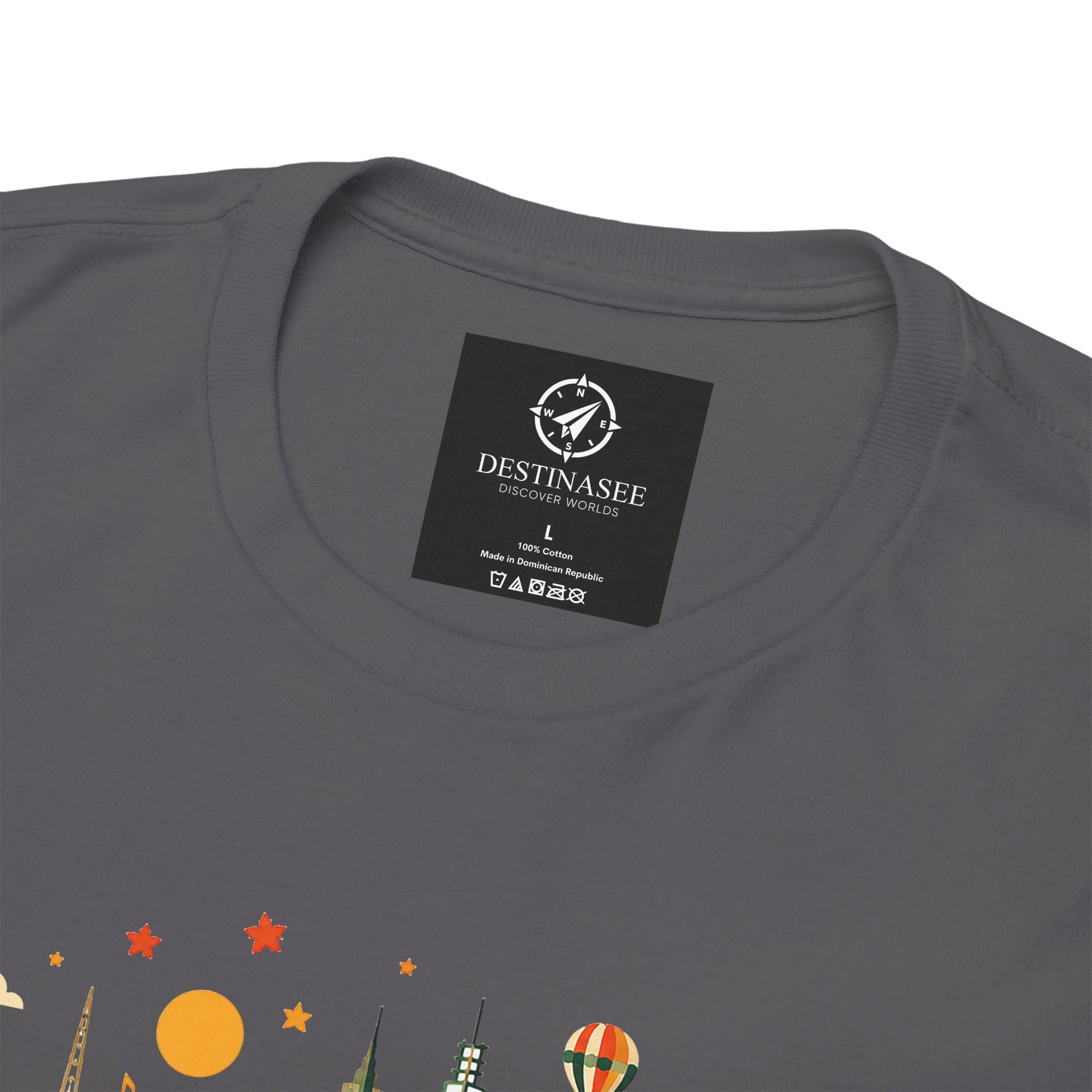 Charcoal gray T-shirt with crew neck and black neck label; partial Melbourne graphic visible.