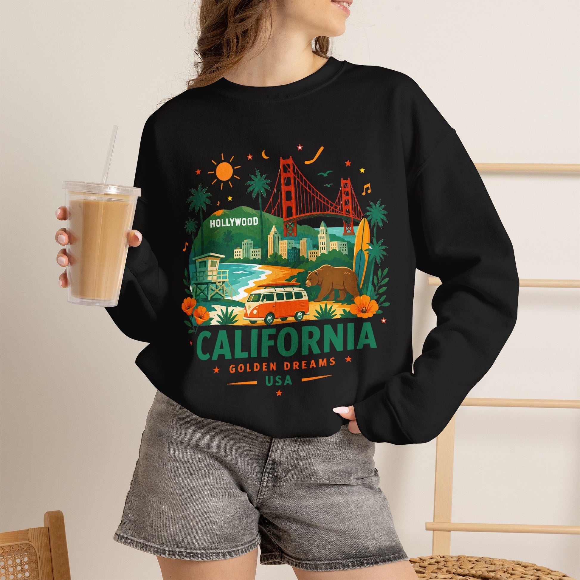 Black crewneck sweatshirt worn by a model with California front graphic