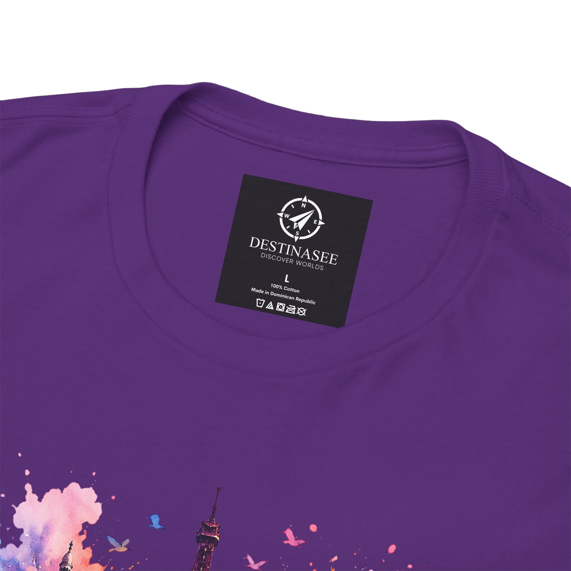 Purple T-shirt close-up: Eiffel Tower floral graphic with neck label on chest