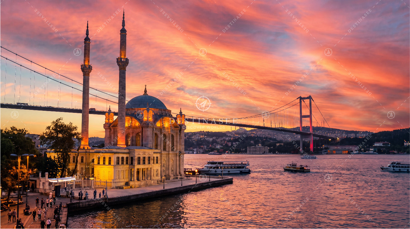 Scenic waterfront wallpaper with a mosque, twin minarets, bridge, and boats