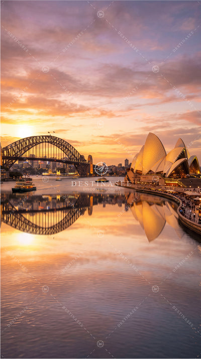 Sydney Harbour mobile wallpaper with Opera House, bridge, and sunset reflections on water